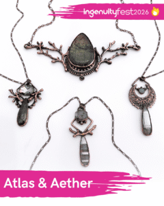 Atlas & Aether - IngenuityFest Vendor 2026 - Table of symbolic handmade jewelry with stones.
