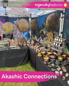 Akashic Connections - IngenuityFest Vendor 2026 - Display of singing bowls, gongs, candles, figurines.
