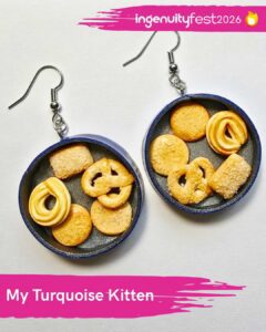 My Turquoise Kitten - IngenuityFest Vendor 2026 - Handmade polymer clay earrings of food on a skillet.