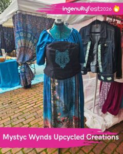 Mystyc Wynds Upcycled Creations - IngenuityFest Vendor 2026 - Mannequin with Celtic wolf bodice and flowered dress and other items for sale.